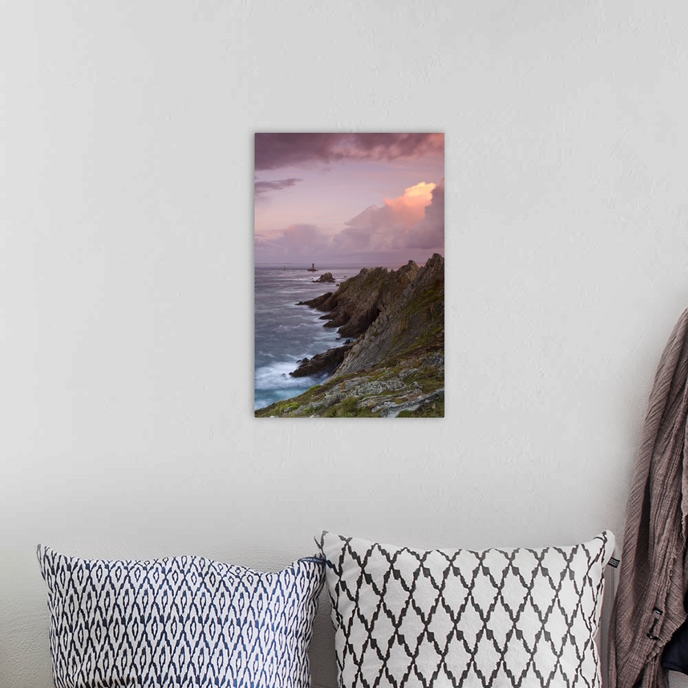 A bohemian room featuring France, Brittany, Dusk descends over the La Vieille lighthouse
