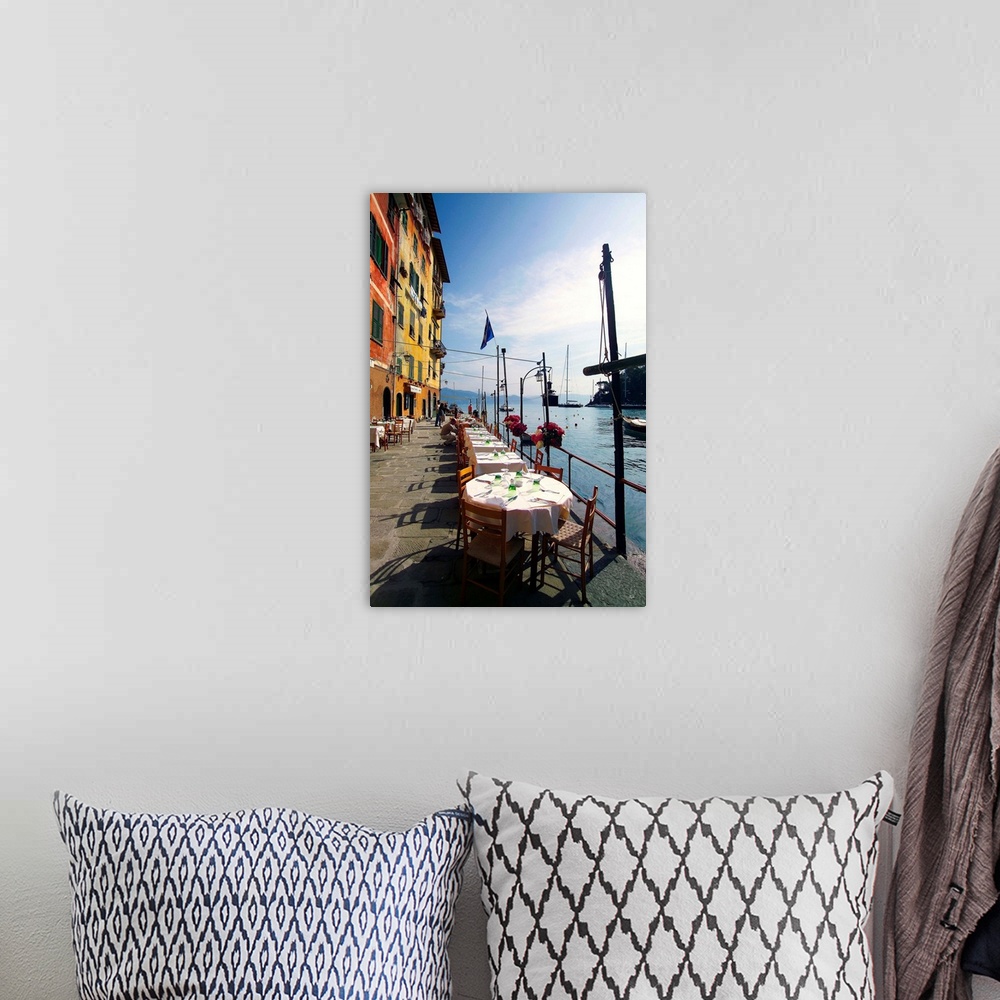 A bohemian room featuring Italy, Liguria, Portofino, Tables along the harbor side.