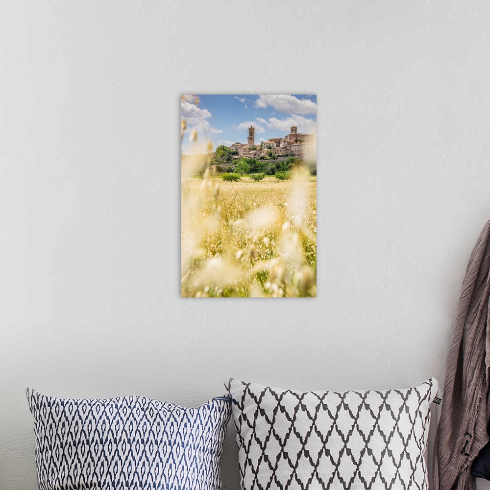 A bohemian room featuring Italy, Umbria, Spello, View of the town from via Francesco Mauri.
