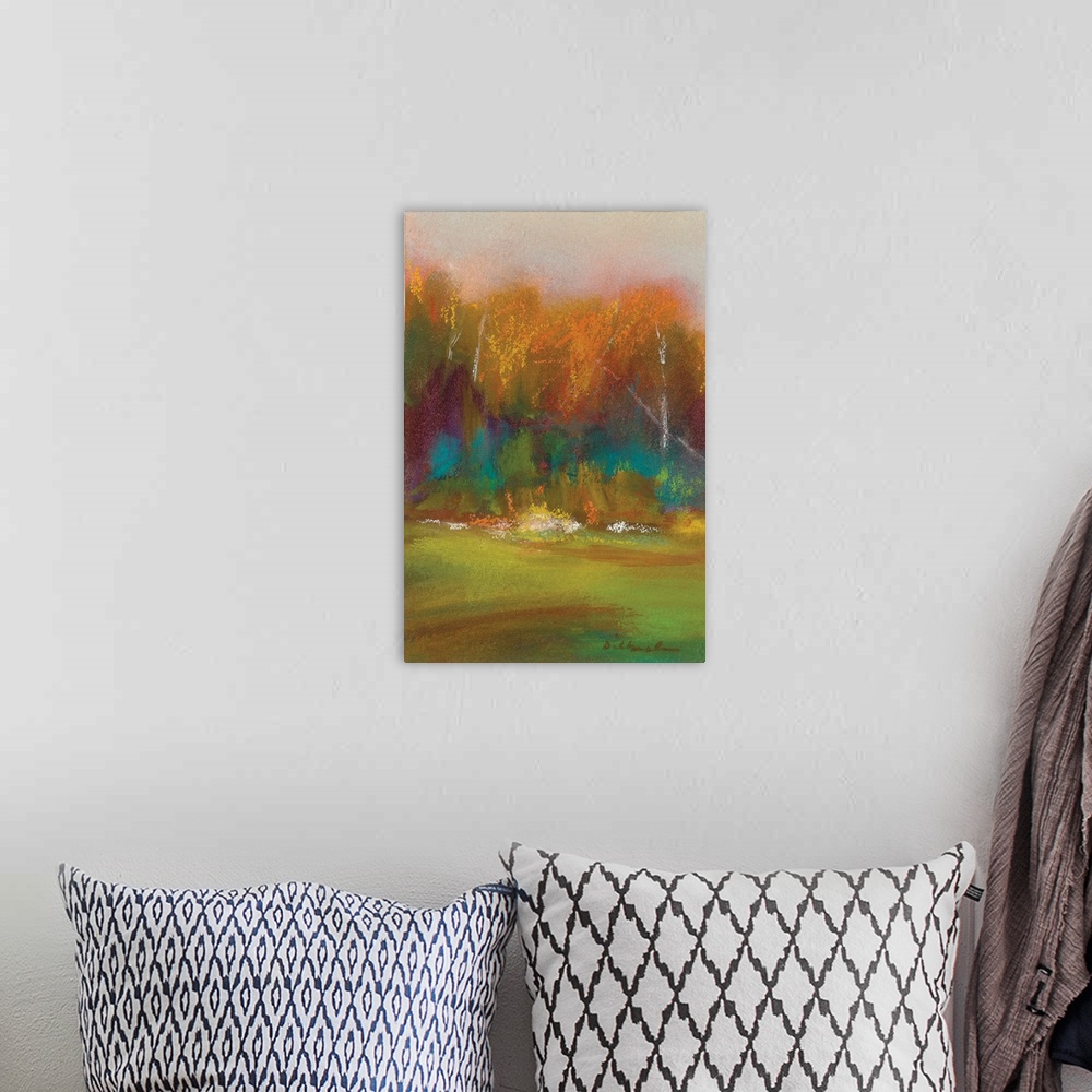 A bohemian room featuring Abstract Autumn landscape painting with green, yellow, orange, purple, and blue hues.