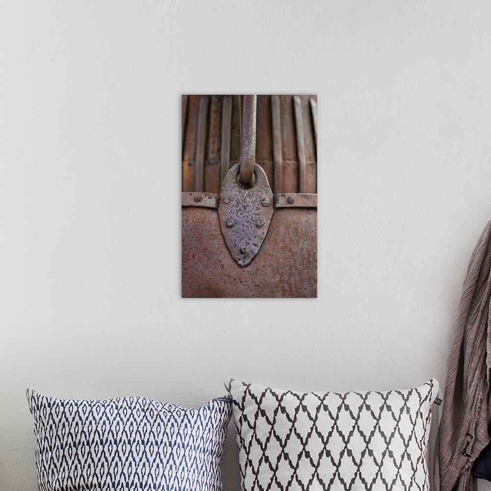 A bohemian room featuring A close up photo of metal elements that have rusted over time.