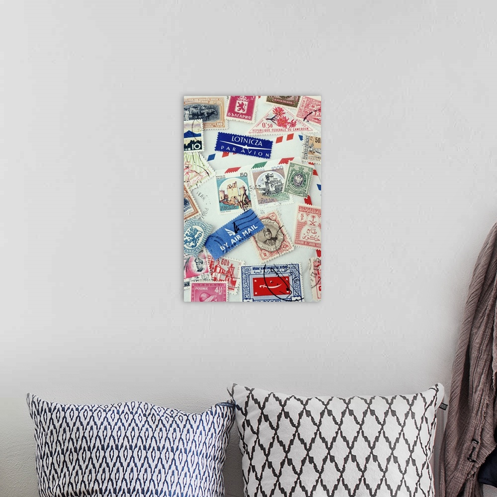 A bohemian room featuring Assorted stamps from various countries, overhead view