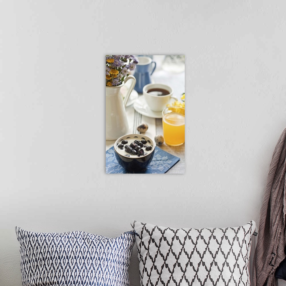 A bohemian room featuring Quick breakfast layout with blueberries and yogurt.