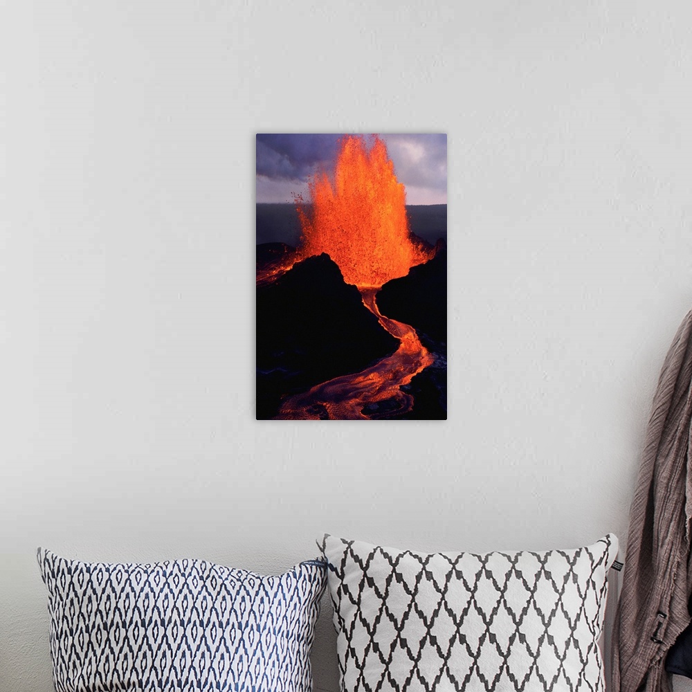 A bohemian room featuring Puu Oo, the easternmost of Kilauea's craters, spews molten lava.