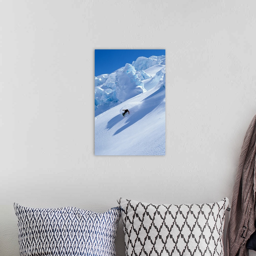 A bohemian room featuring Snowboarder on mountain snowboarding