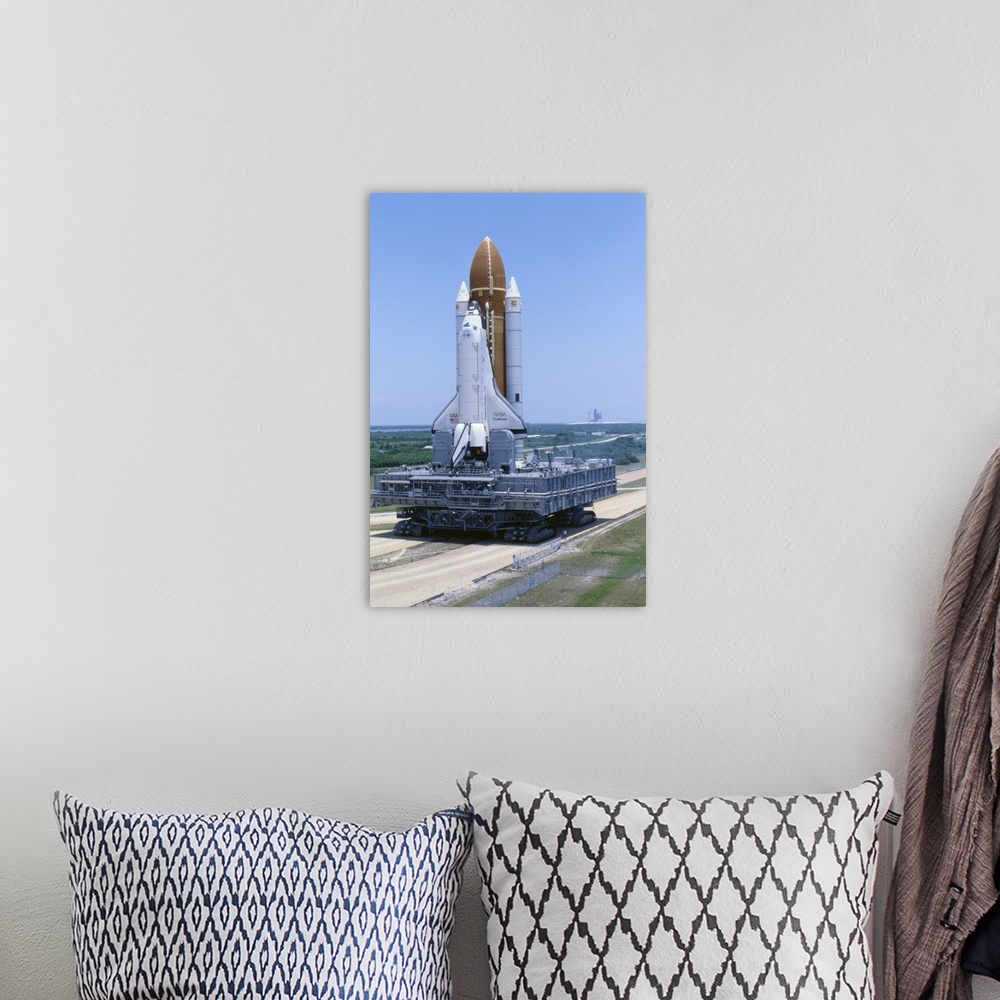 A bohemian room featuring Kennedy Space Center, Florida: The space shuttle Challenger is slowly rolled out to the launch pa...