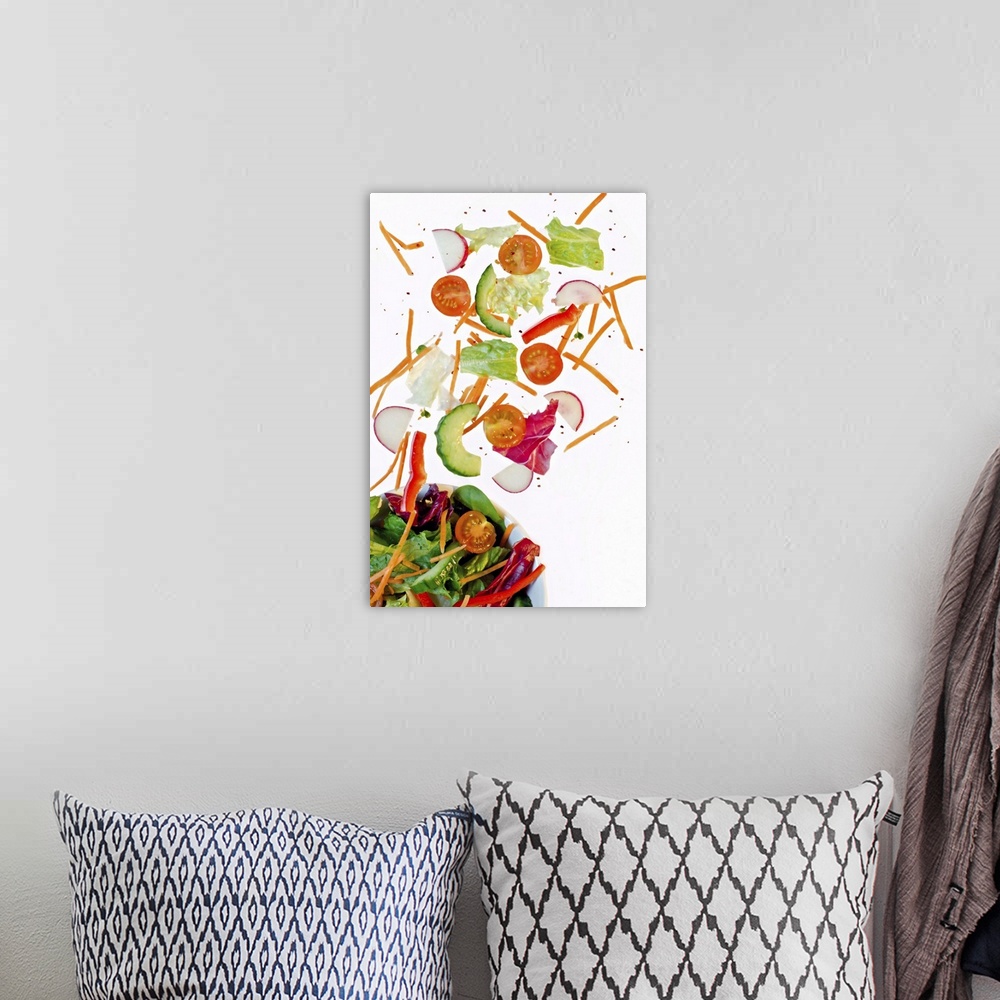 A bohemian room featuring Fresh salad ingredients on a white background.