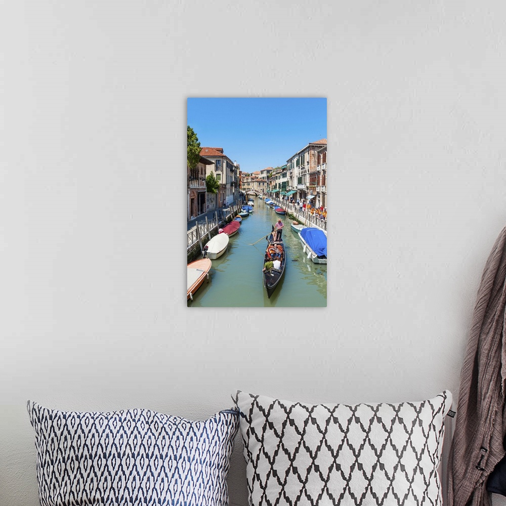 A bohemian room featuring View of gondola on the canal in Venice, Italy.