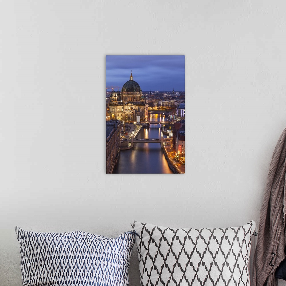 A bohemian room featuring Berlin Cathedral, Berliner Dom, seen fom the Fischerinsel at dusk, the river Spree in the foregro...
