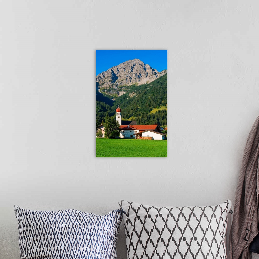 A bohemian room featuring Heiterwang with Thaneller mountain, Tyrol, Austria.