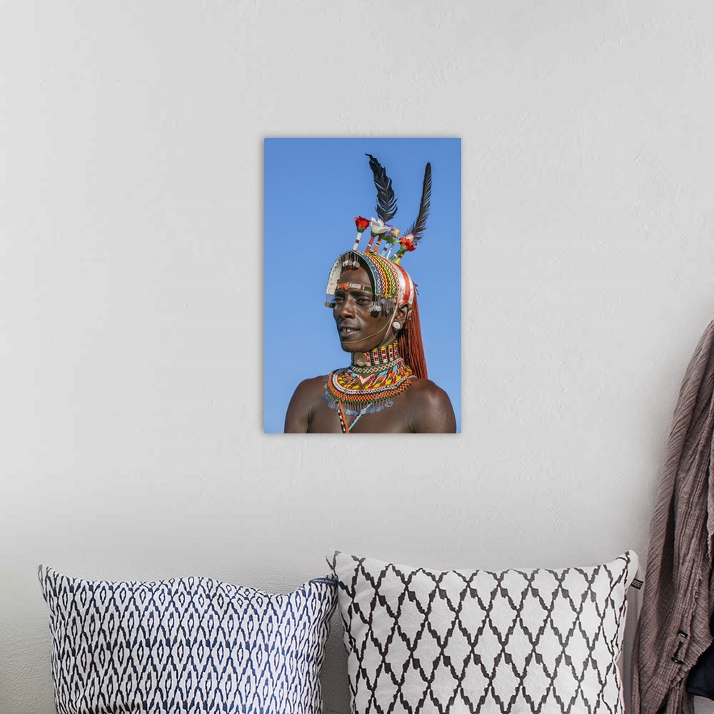 A bohemian room featuring Kenya, Kirimun, Samburu County. A portrait of a Samburu warrior in all his finery.