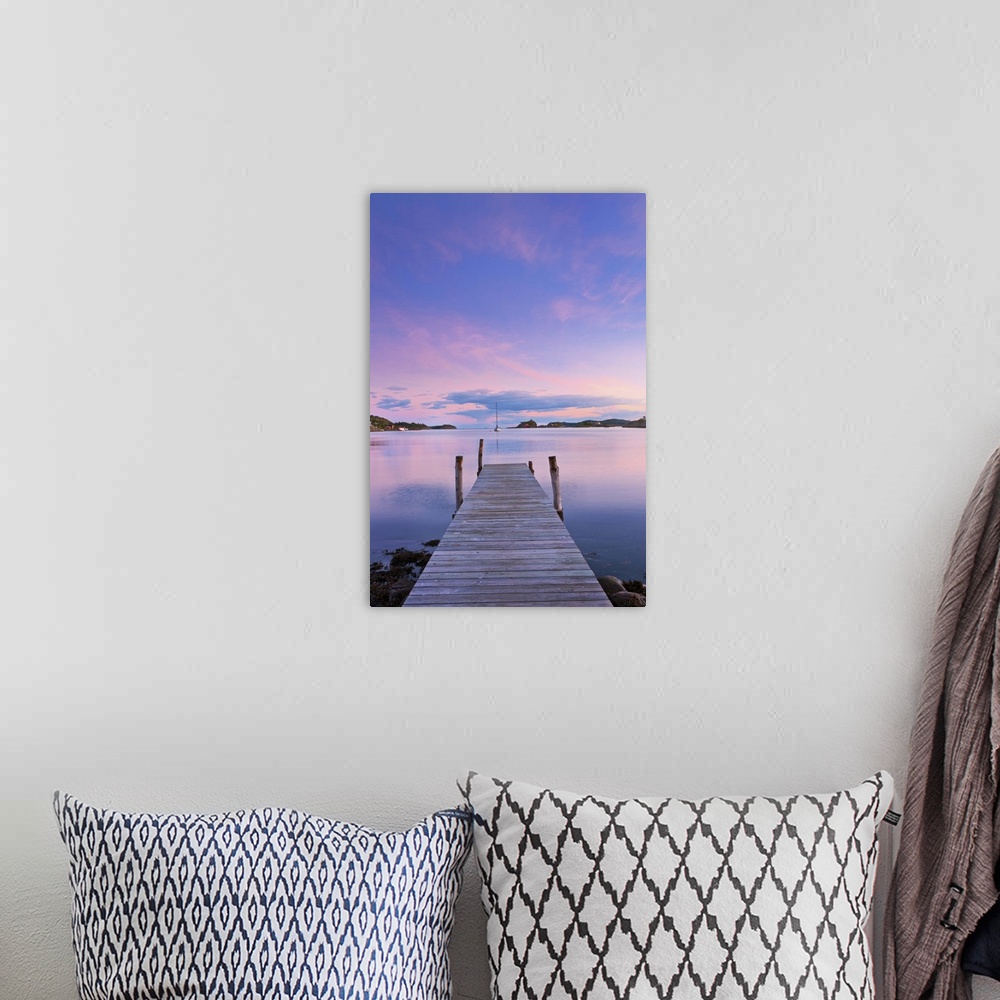 A bohemian room featuring Norway, Oslo, Oslo Fjord, jetty over lake at dusk