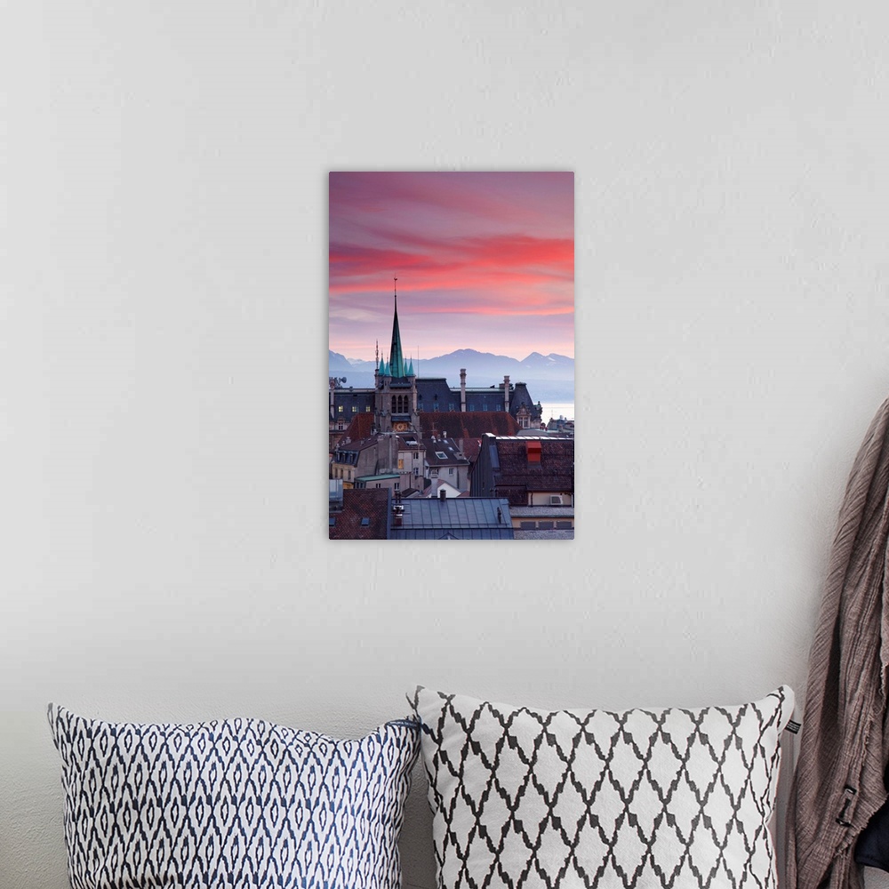 A bohemian room featuring St Francois Church and city skyline at dusk, Lausanne, Vaud, Switzerland