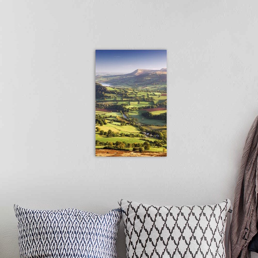 A bohemian room featuring The River Usk and rolling countryside in the Brecon Beacons National Park, Powys, Wales, UK. Autu...