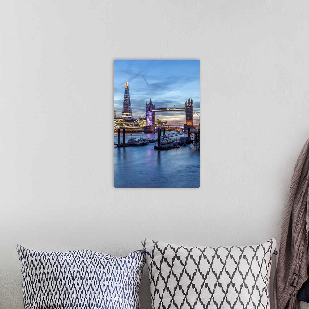 A bohemian room featuring The Tower Bridge in London seen from the east at dusk, London, England.