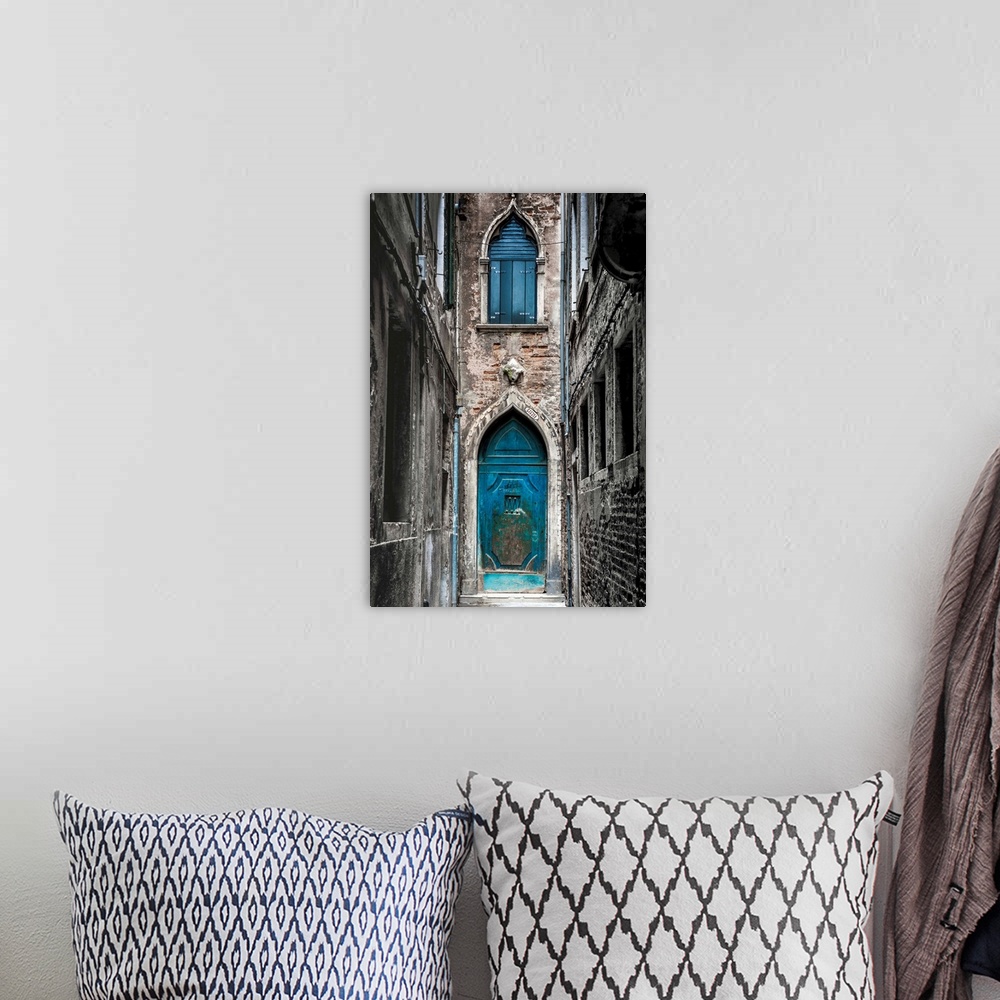A bohemian room featuring Venice, Veneto, Italy. Blue Moorish Door In A Narrow Street.