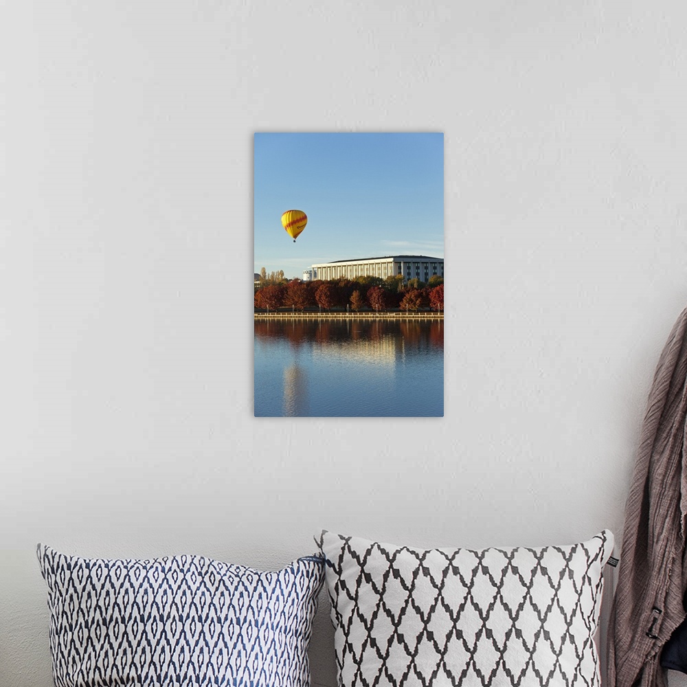 A bohemian room featuring Australia, Australian Capital Territory (ACT), Canberra. View across Lake Burley Griffin to hot a...