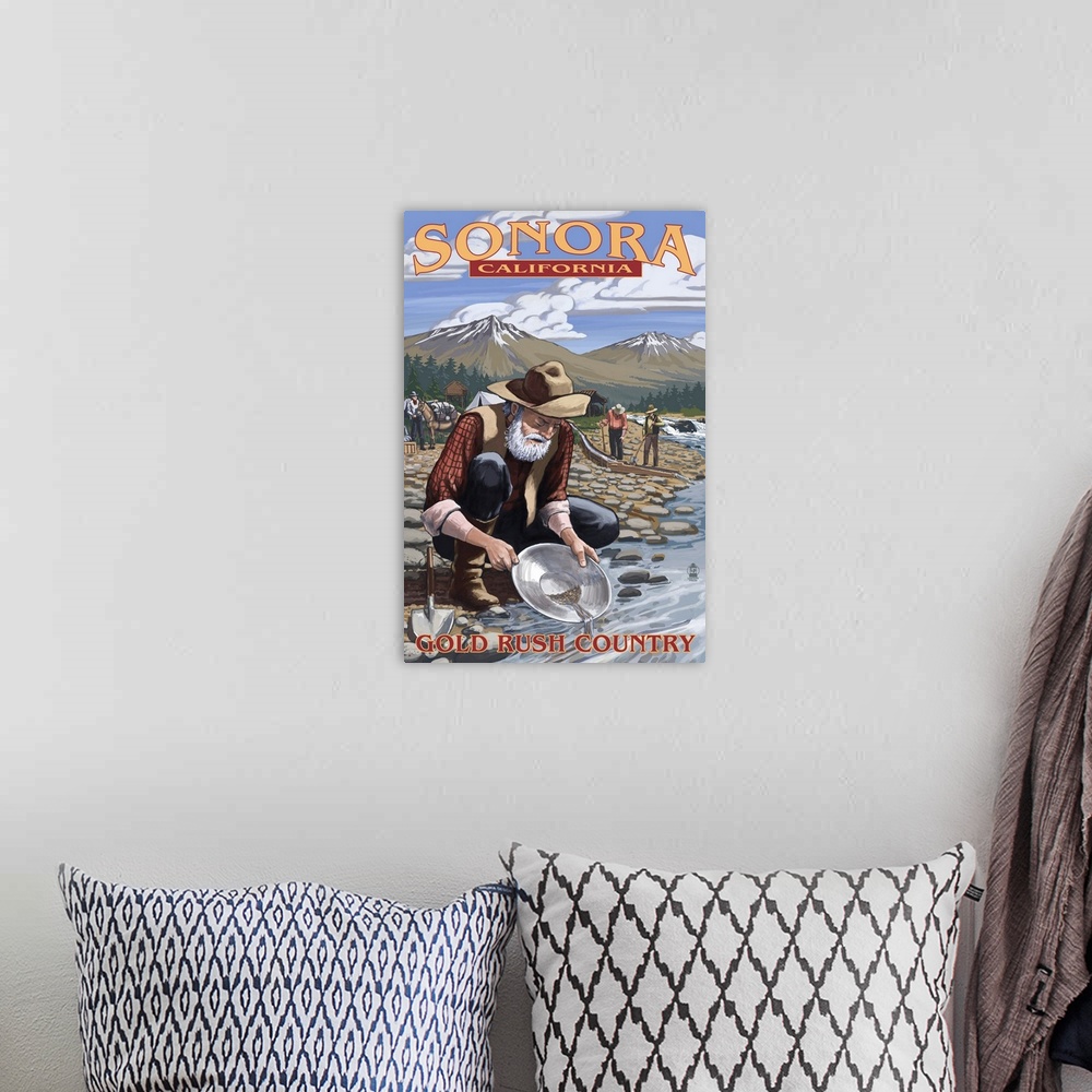 A bohemian room featuring Retro stylized art poster of a pioneer knelt beside a rocky stream, panning for gold.