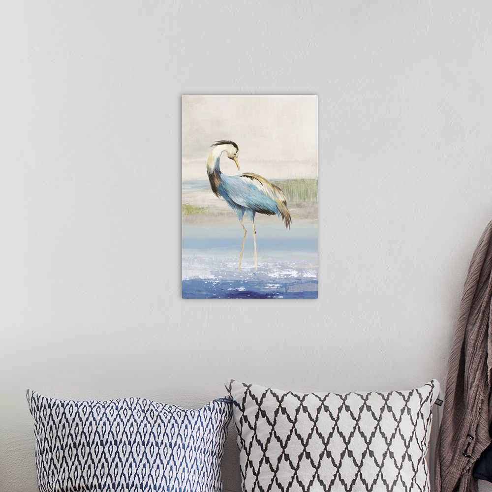 A bohemian room featuring Contemporary artwork of a great blue heron standing in shallow water.