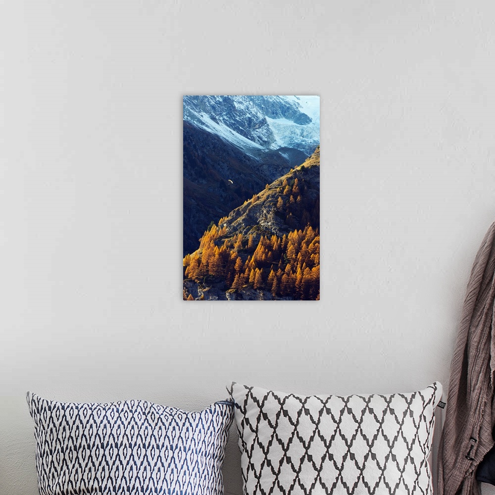 A bohemian room featuring A paraglider flying in autumn, Zermatt, Valais, Swiss Alps, Switzerland, Europe