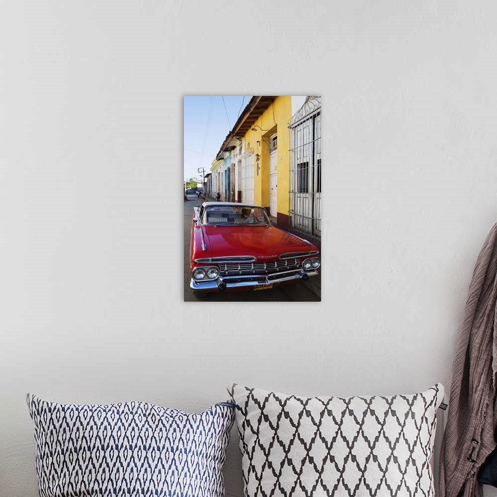A bohemian room featuring Chevrolet, classic 1950's American car, Trinidad, Cuba, West Indies