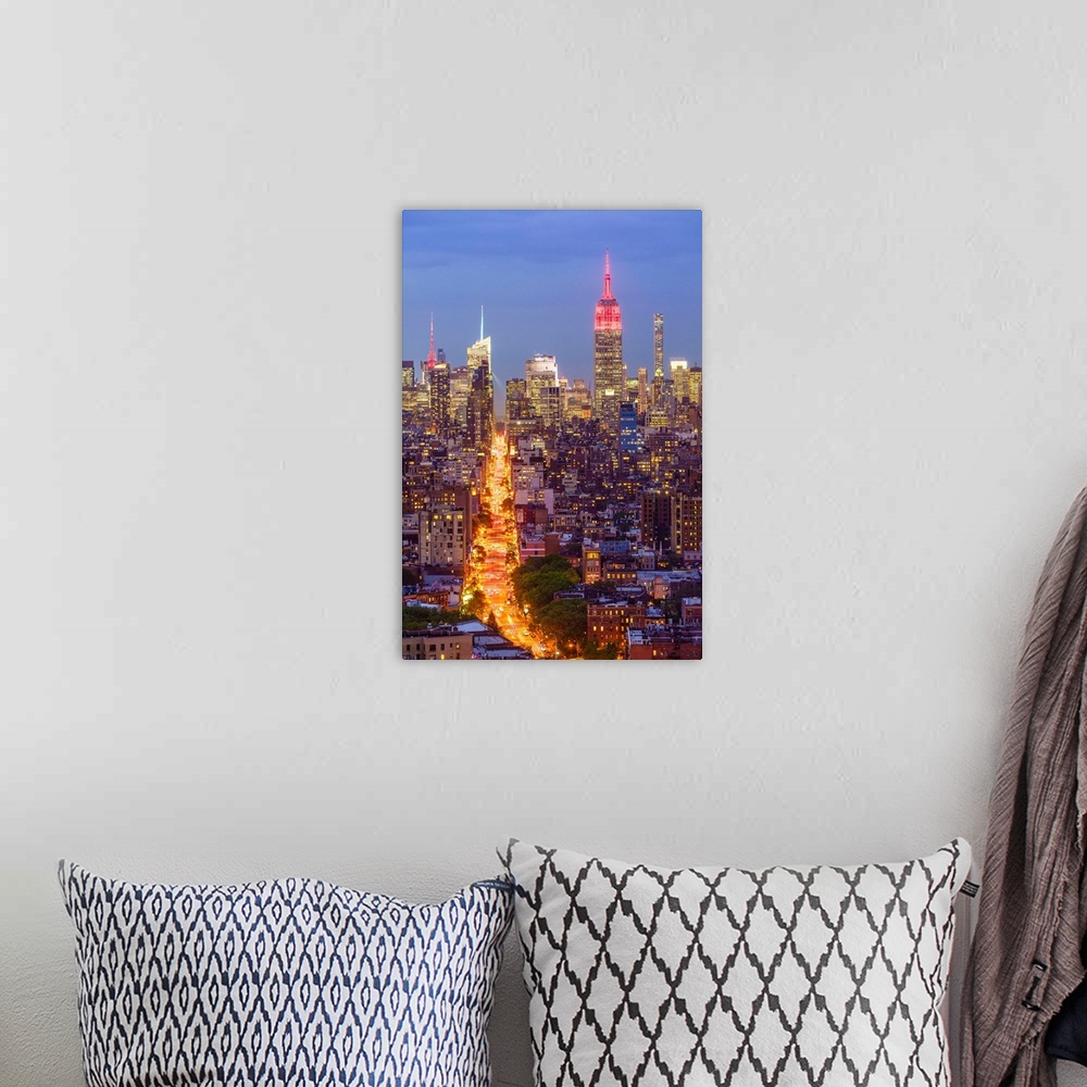 A bohemian room featuring Manhattan skyline at dusk with the Empire State Building, New York City