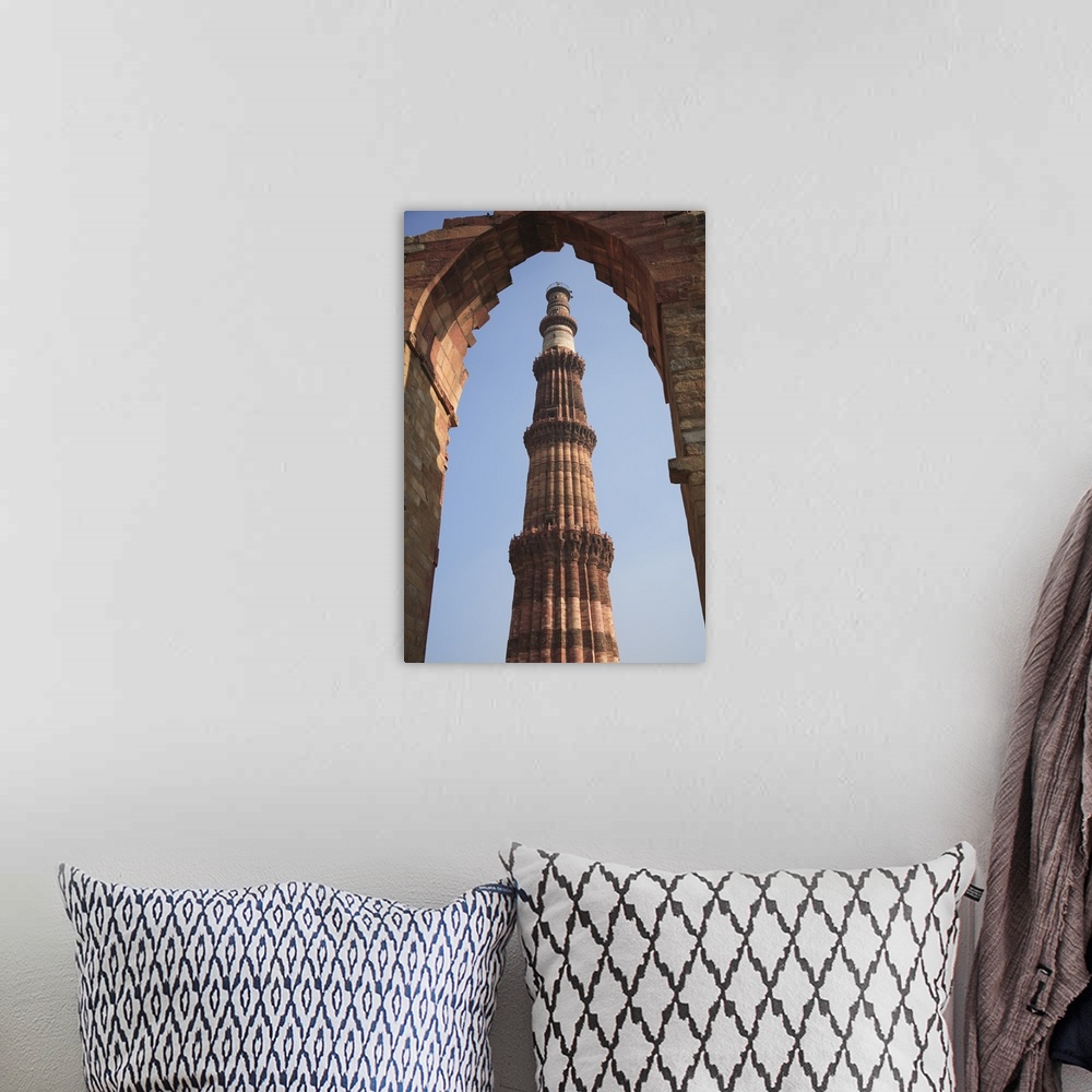 A bohemian room featuring Qutab Minar Tower, New Delhi, India