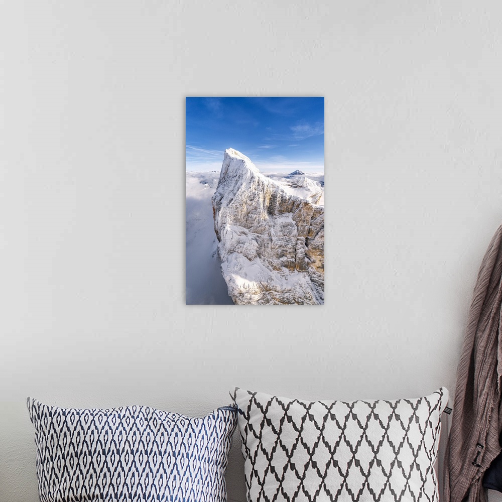 A bohemian room featuring Rock face of Monte Pelmo covered with snow, aerial view, Dolomites, Belluno province, Veneto, Ita...