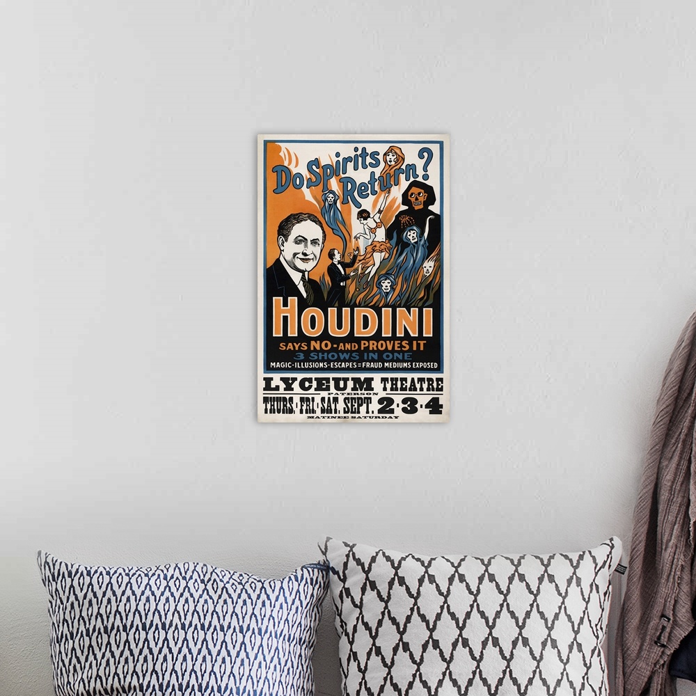A bohemian room featuring A theatre poster for Harry Houdinios performance at the Lyceum theatre in London.