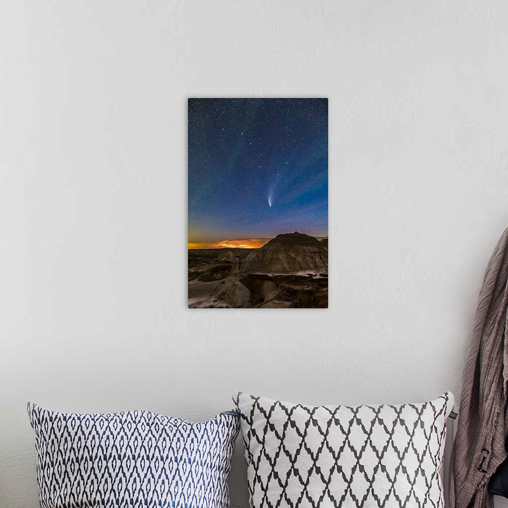 A bohemian room featuring Comet NEOWISE (C/2020 F3) over the badlands formations at Dinosaur Provincial Park, Alberta, Cana...