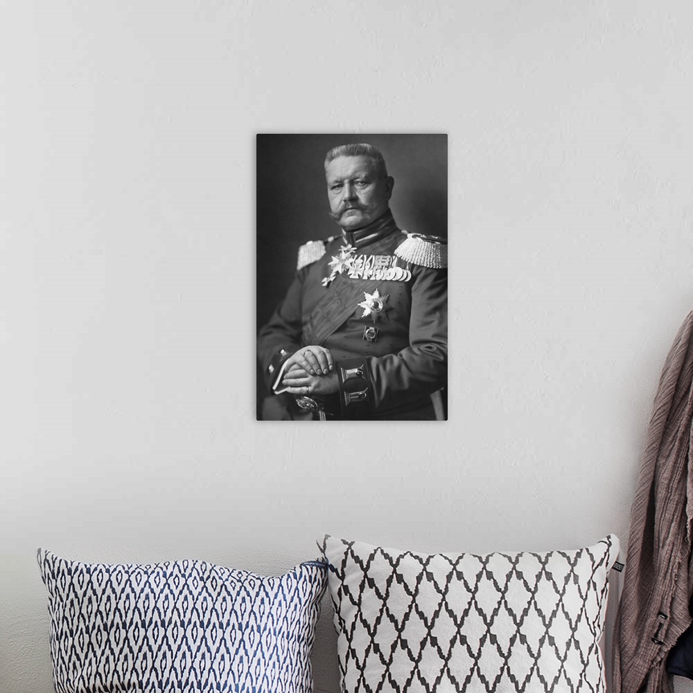 A bohemian room featuring Portrait of Paul von Hindenburg, dated 1914.