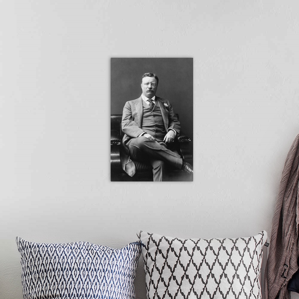 A bohemian room featuring Presidential history photograph of Theodore Roosevelt, dated 1906.