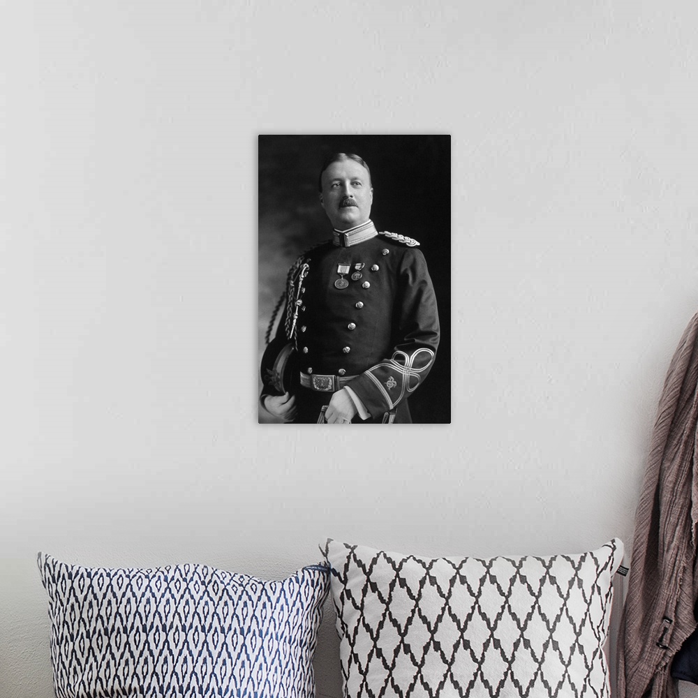 A bohemian room featuring Vintage portrait of Captain Archibald Butt in his military uniform.
