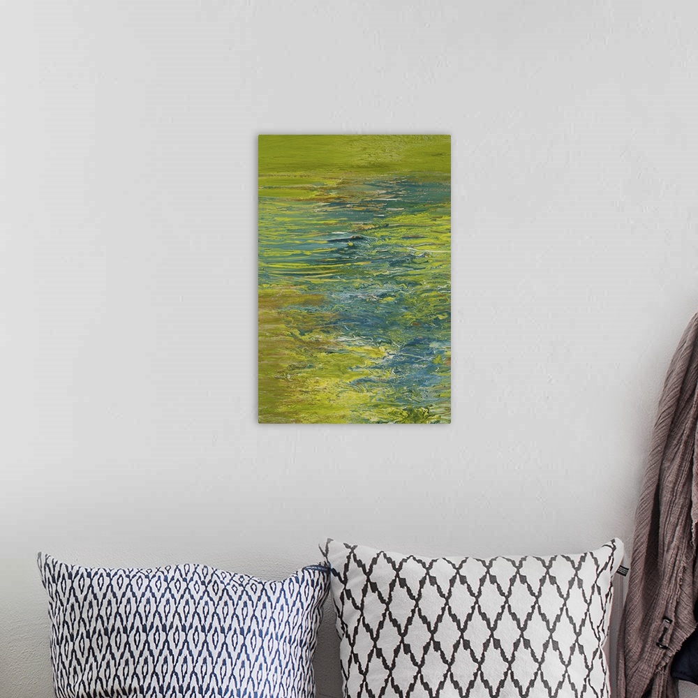 A bohemian room featuring Abstract painting in blue and green resembling ripples on water.