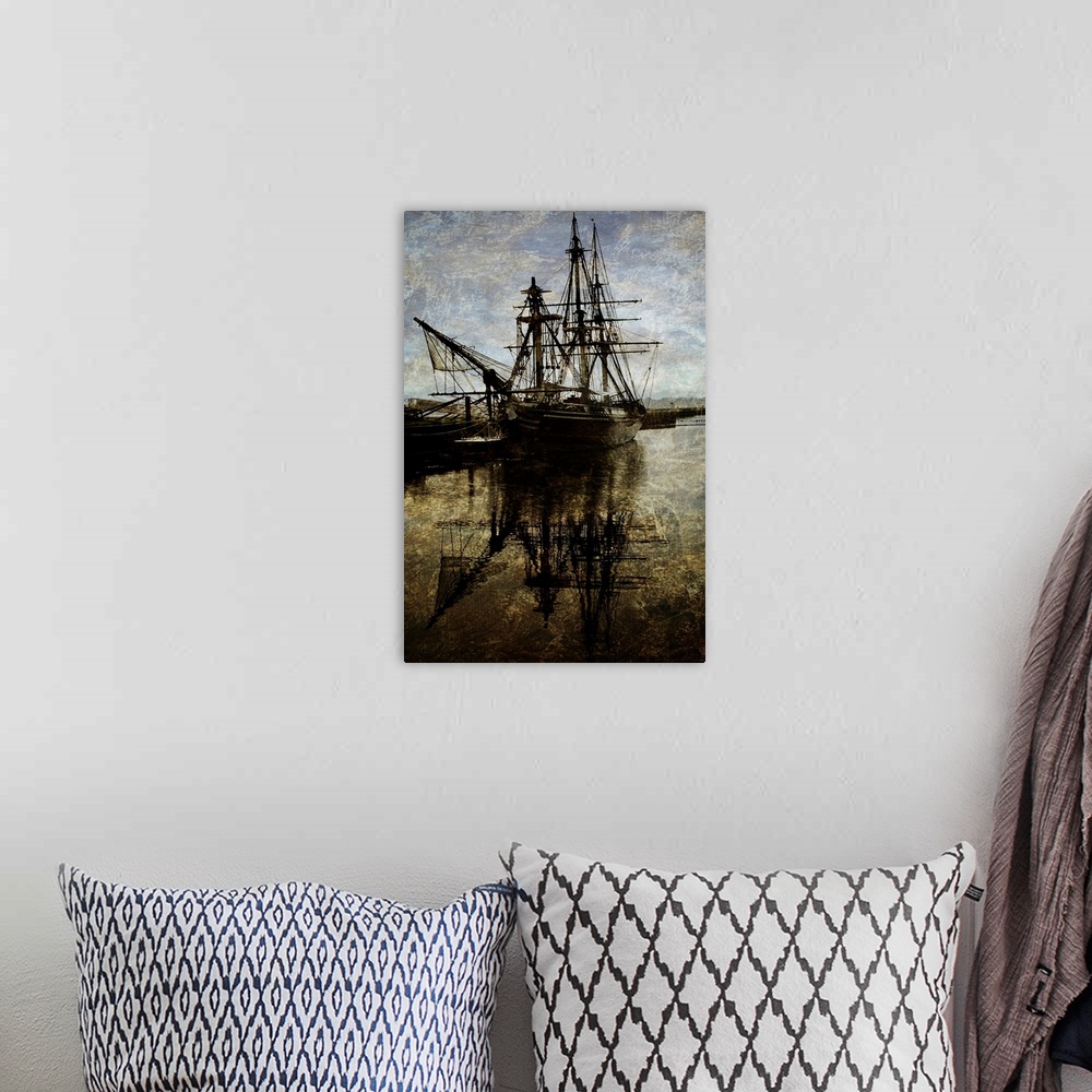 A bohemian room featuring A three-masted sailing ship at dock.