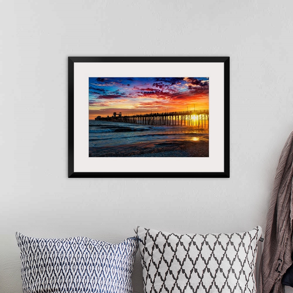 A bohemian room featuring Colorful sunset at the Oceanside Pier. Oceanside is 35 miles North of San Diego, California, USA.
