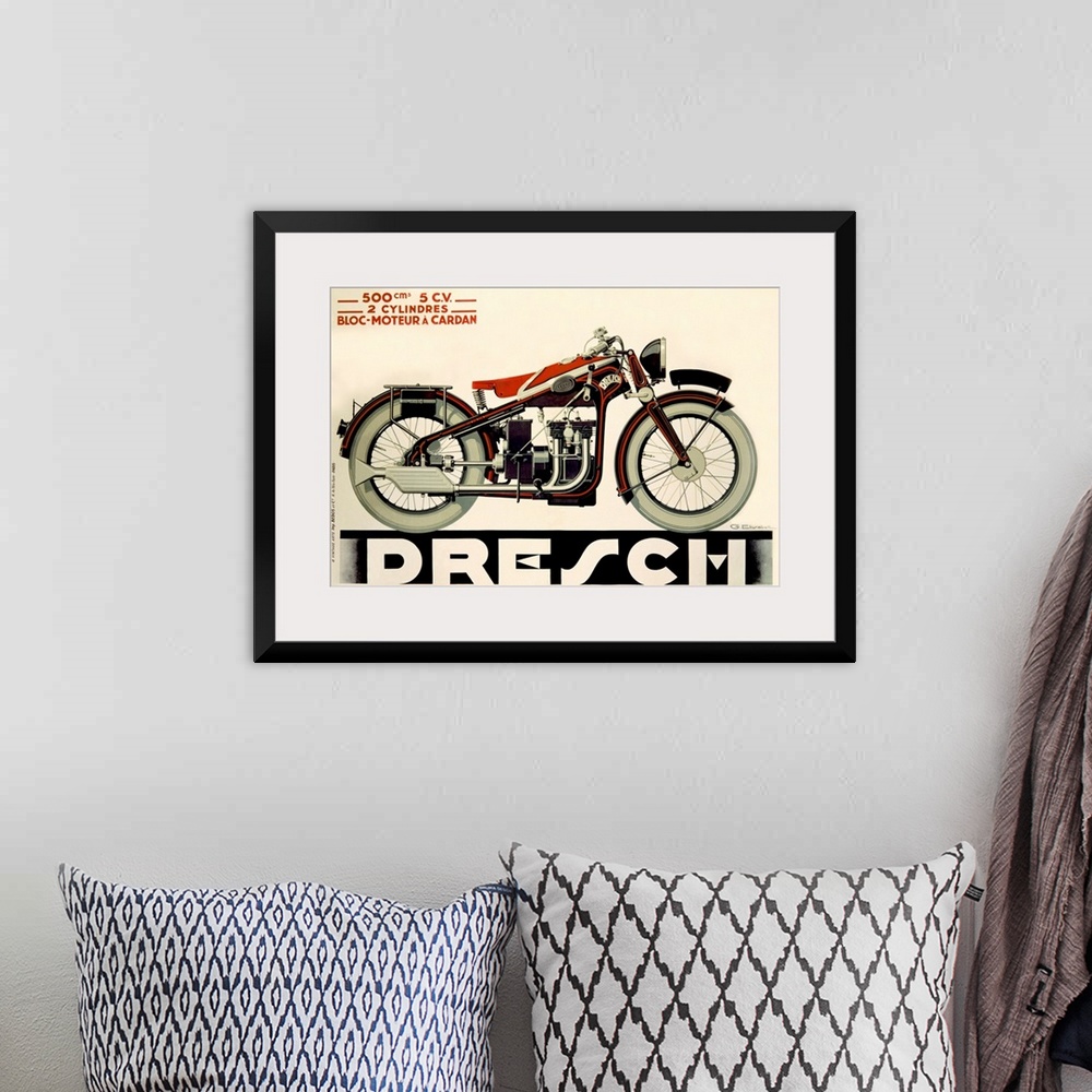 A bohemian room featuring Large, horizontal vintage art advertisement of a Dresch, 500 CC Motorcycle in black and red, on a...