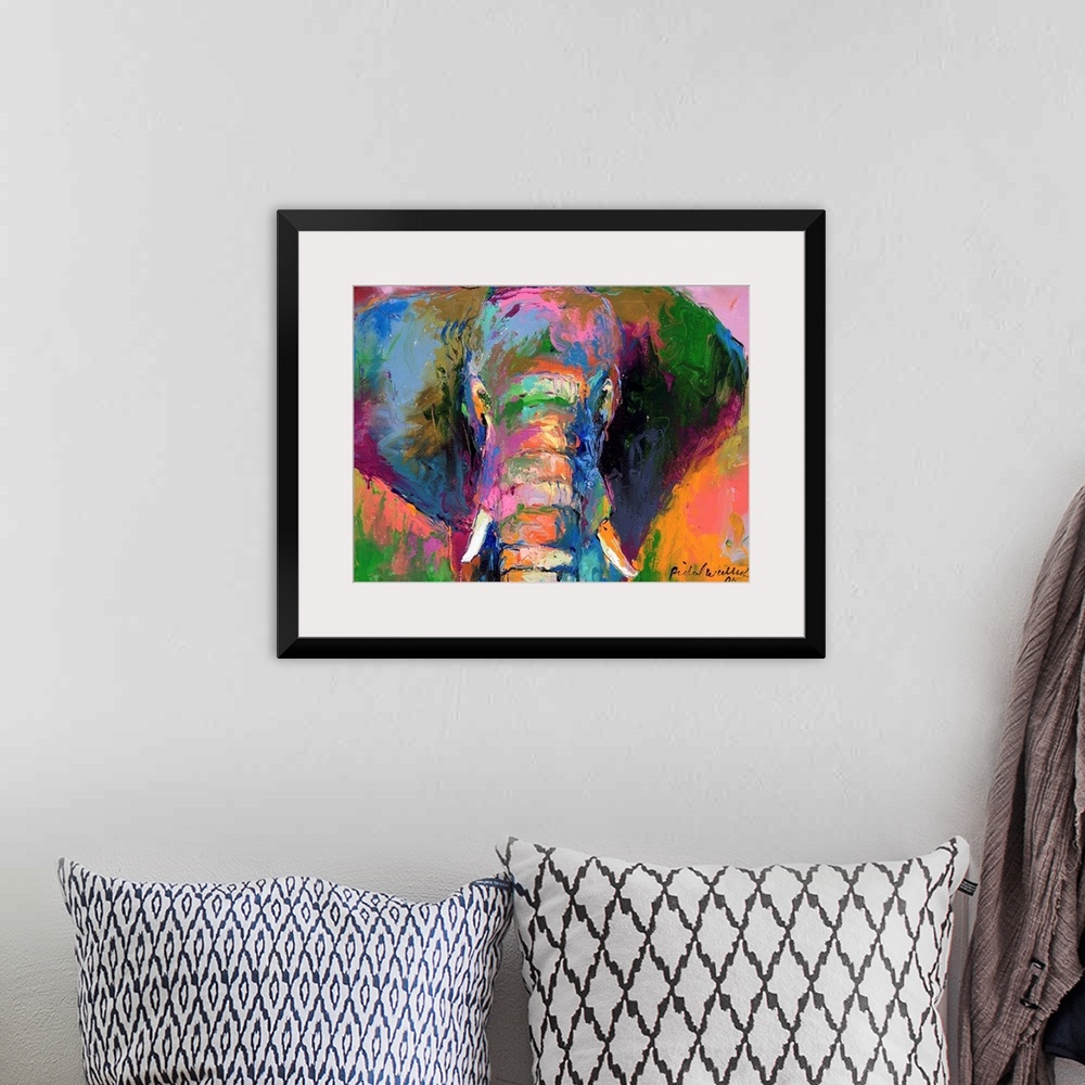 A bohemian room featuring Contemporary vibrant colorful painting of an elephant.