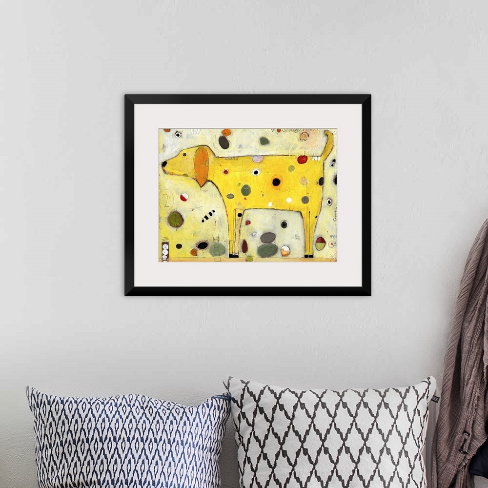 A bohemian room featuring Lighthearted contemporary painting of yellow dog with spots.
