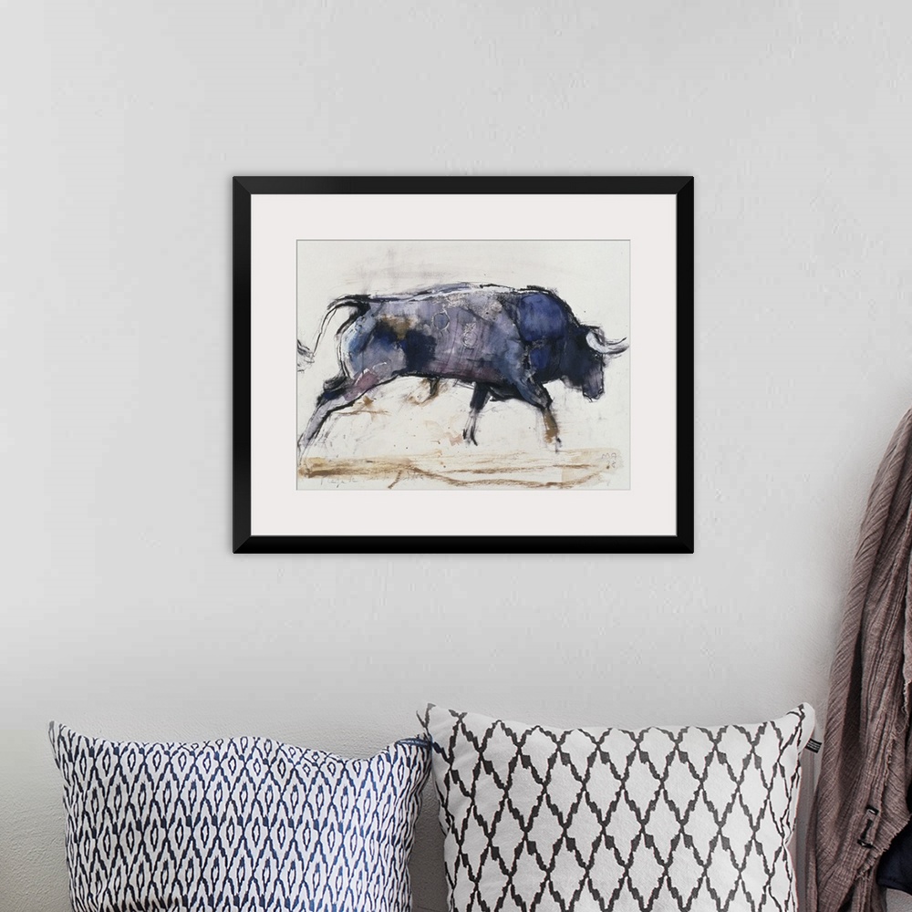 A bohemian room featuring Contemporary painting of a charging bull.l