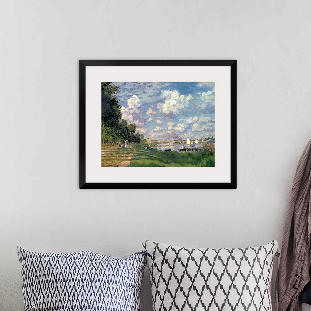 A bohemian room featuring This wall art is a landscape painting of a river scene by an Impressionist master showing a road ...