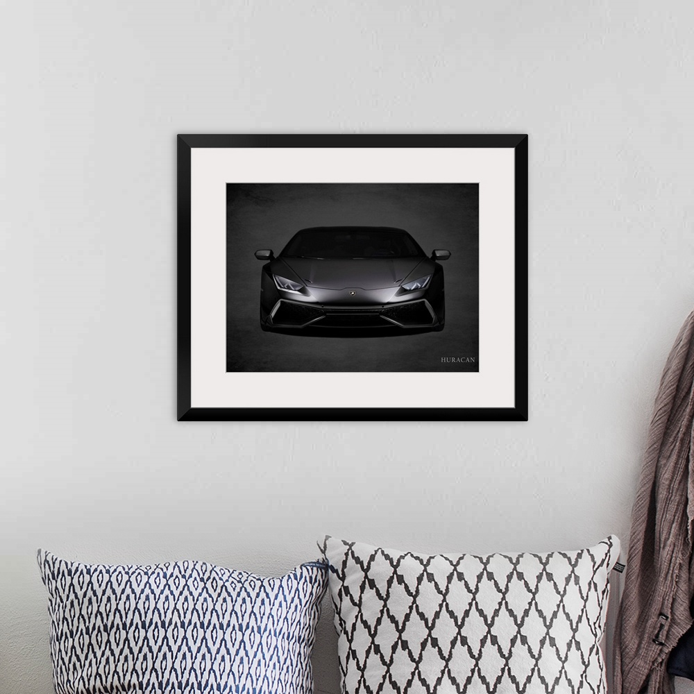 A bohemian room featuring Photograph of a black Lamborghini Huracan printed on a black background with a dark vignette.