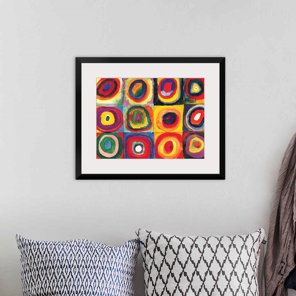 A bohemian room featuring A Contemporary painting of colorful rings of circles within squares.