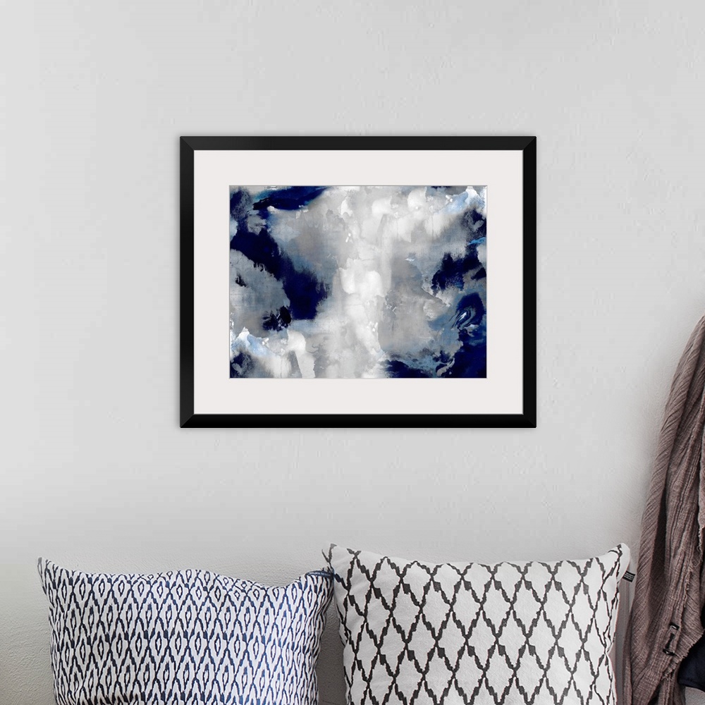 A bohemian room featuring A large, horizontal abstract painting in shades of indigo and white. This statement piece of art ...