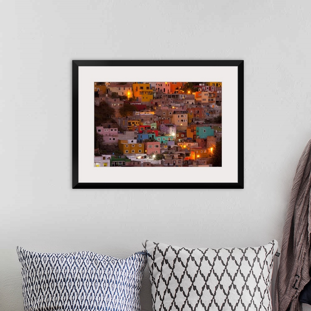 A bohemian room featuring North America, Mexico, Guanajuato. The colorful homes and buidings of Guanajuato at night