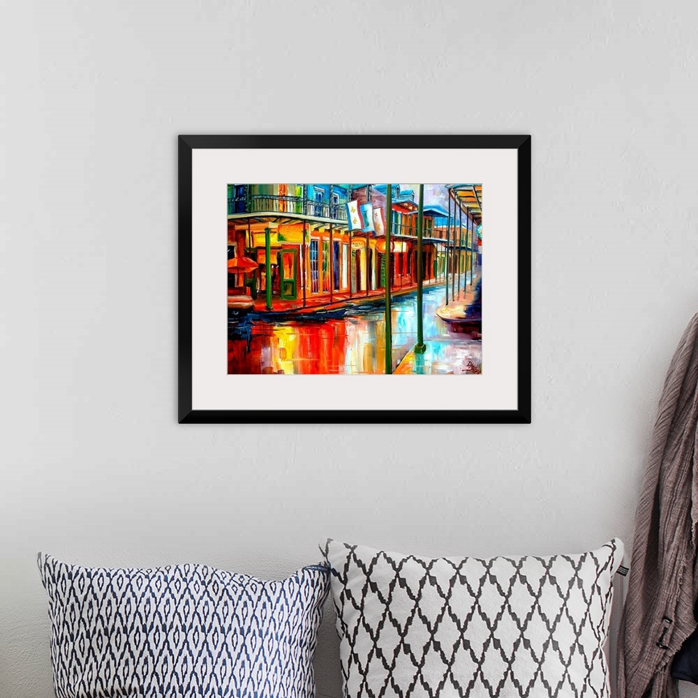 A bohemian room featuring Boldly colored contemporary painting of historic park in French Quarter of New Orleans.  Shops li...
