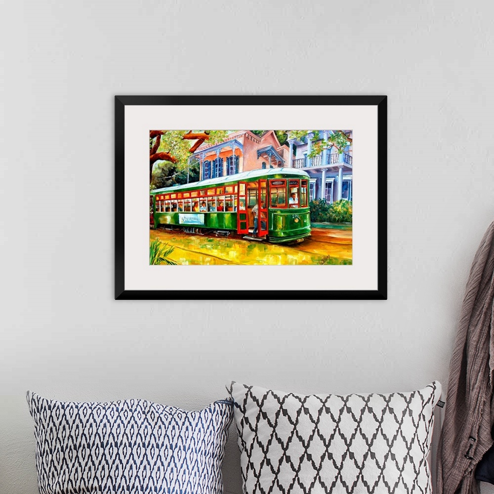 A bohemian room featuring Contemporary landscape painting of a New Orleans street lined with beautiful homes.