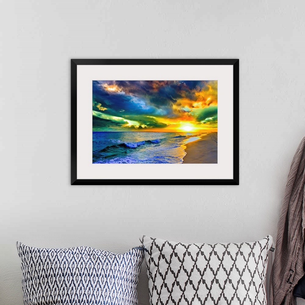 A bohemian room featuring A beautiful sea at sunset in this landscape photo. A seascape with waves on the shore before a be...