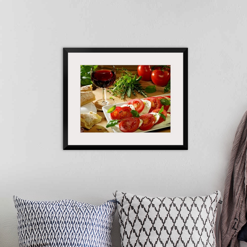 A bohemian room featuring This photograph is a still life of traditional Italian food. A wood table is covered with crusty ...
