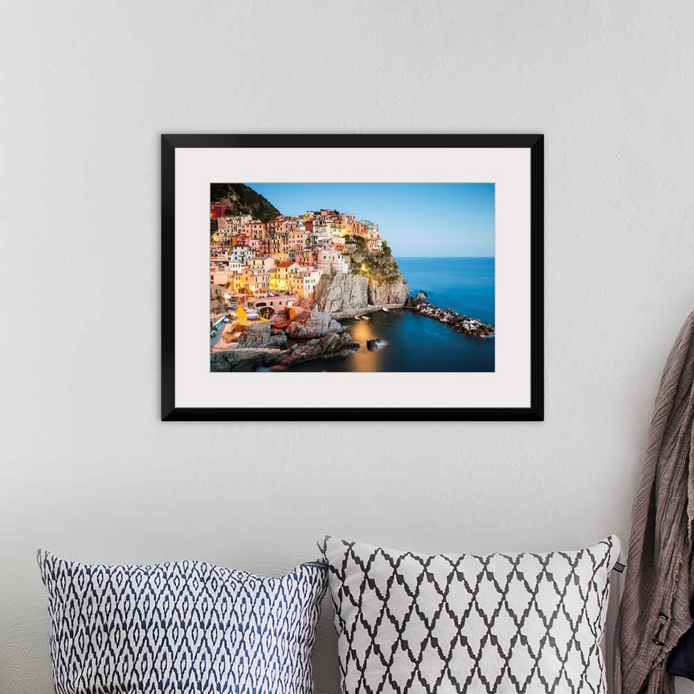 A bohemian room featuring Dusk in Manarola, Cinque Terre, Liguria, Italy